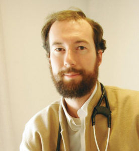Portrait of a male doctor with a stethoscope.